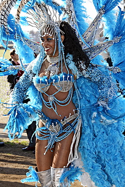 Racy Samba dancer wearing a sophisticated feather costume, Rosenmontagszug Carnival Parade 2011, Duesseldorf, North Rhine-Westphalia, Germany, Europe