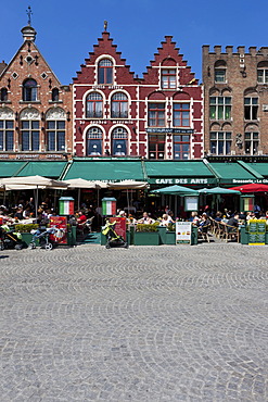 Guild houses and outdoor restaurants in Grote Markt square, historic centre of Bruges, UNESCO World Heritage Site, West Flanders, Flemish Region, Belgium, Europe