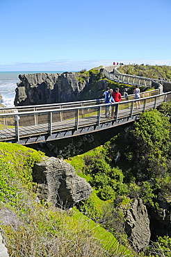 Tourists visiting the Pancake Rocks rock formations, Punakaiki, Paparoa National Park, South Island, New Zealand