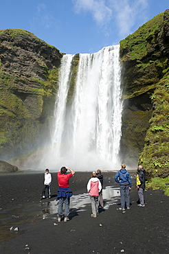 Large waterfall Skogafoss with tourists, Skogar, Iceland, Scandinavia, Northern Europe, Europe