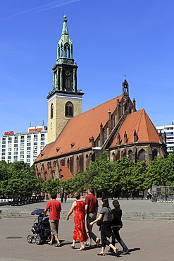 Tourists in front of Marienkirche Church on Alexanderplatz Square in Berlin, Germany, Europe