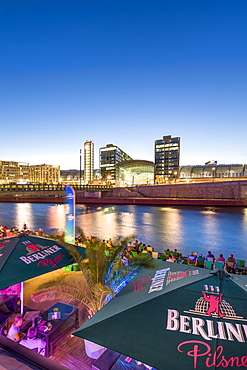 Beach bar Capital Beach at dusk at the river Spree opposite central railway station, Berlin-Mitte, Berlin, Germany, Europe