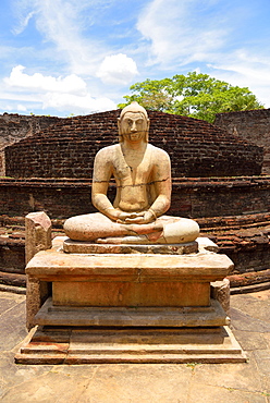 Ruin of a temple with moonstone and Buddha statue, Polonnaruwa, North Central Province Sri Lanka