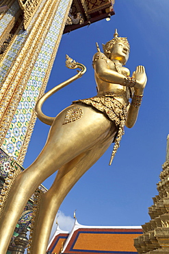 Statue of Kinnari, traditional symbol of feminine beauty, at Wat Phra Kaeo, the Royal Grand Palace, Bangkok, Thailand, Asia