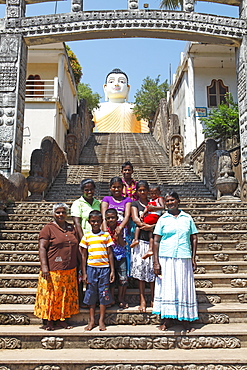 Women and children on the stairs to the Great Buddha, Kande Vihara Temple, Beruwela, Western Province, Ceylon, Sri Lanka, Asia