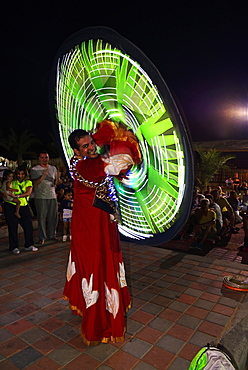 Bedouin turns luminous cape in Bedouin Oasis Desert Experience, Ras al Khaimah, United Arab Emirates, Asia