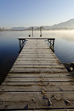 Lake Kochel with morning fog near Schlehdorf, Pfaffenwinkel, Upper Bavaria, Bavaria, Germany, Europe