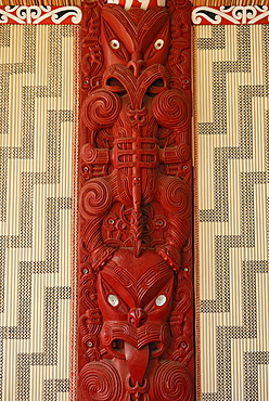 Maori carving, wooden relief with mother of pearl inlays, figural representation and ornaments, Maori Meeting House, Waitangi Treaty Grounds, Waitangi, North Island, New Zealand