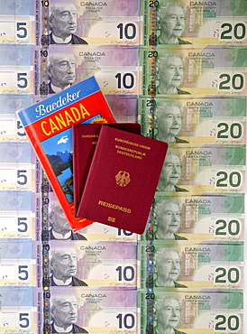 Passport of the Federal Republic of Germany, guide book for Canada, various Canadian dollar banknotes