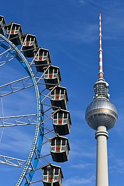 Fernsehturm television tower and a ferris wheel on Alexanderplatz square, Berlin, Germany, Europe