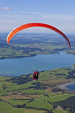 Tandem paragliders overlooking Froggensee lake, Tegelberg Mountain, Upper Bavaria, Bavaria, Germany, Europe, PublicGround