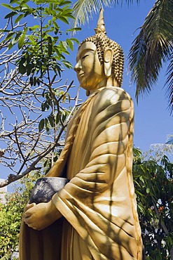 Buddha statue holding a begging bowl, Luang Prabang, UNESCO World Heritage Site, Laos, Indochina, Asia