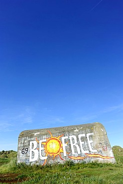 Old bunker in the dunes, with the graffiti "Be Free", Fano island, Denmark, Scandinavia, Europe