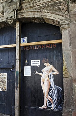 Female nude holding an iPhone, graffito on a decrepit house, an artists' centre in Weimar, Thuringia, Germany, Europe