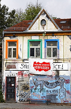 Condemned buildings in the historic district, painted with graffiti and an anti-Nazi slogan, alternative scene, Weimar, Thuringia, Germany, Europe