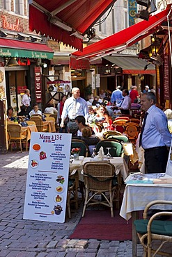 Tourists at a sidewalk cafe on the Rue d'Une Personne, Brussels, Belgium, Benelux, Europe