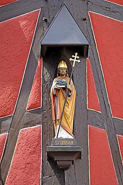 Statue of St Urban, 1704, on a half-timberd house, Hauptstrasse 33, Gengenbach, Baden-Wuerttemberg, Germany, Europe