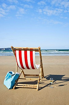 Empty deck chair on the beach, Camaret-sur-Mer, Finistere, Brittany, France, Europe