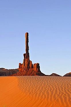 Sand dunes in front of Totem Pole rock formation, Monument Valley, Navajo Tribal Park, Navajo Nation Reservation, Arizona, Utah, United States of America, USA