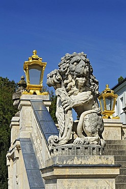 A lion sculpture and lanterns at Nymphenburg Palace, Munich, Bavaria, Germany, Europe