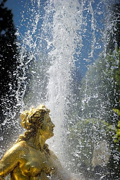 Sculpture of a golden lady, fountain sculpture in the park of Schloss Linderhof Castle near Oberammergau, Allgaeu, Bavaria, Germany, Europe