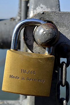 Padlock, Made in Germany, at a barrier fence along the Rhine Promenade, Duesseldorf, North Rhine-Westphalia, Germany, Europe