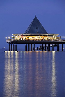 Illuminated pier at dusk, magic hour, seaside resort of Heringsdorf, Usedom island, Baltic Sea, Mecklenburg-Western Pomerania, Germany, Europe