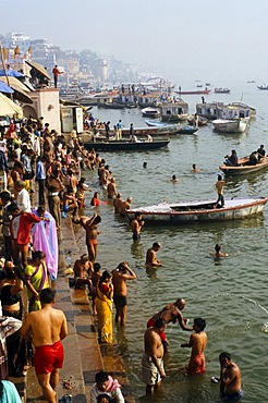 The ghats in Varanasi are busy with pilgrims every morning, Varanasi, Uttar Pradesh, India, Asia