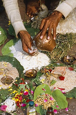 A small ritual as part of the praying ritual for the good reincarnation of a dead person, Haridwar, Uttarakhand, formerly Uttaranchal, India, Asia