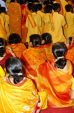 A group of women joining the Aartii Ceremony at Ram Jhula in Rishikesh, Uttarakhand, formerly Uttaranchal, India, Asia