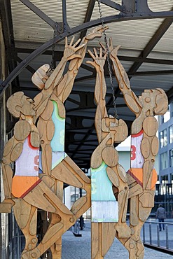 Basketball players, wooden figures by Otl Aicher, Deutsches Sport- und Olympia-Museum or German Sports and Olympic Museum, Rheinauhafen district, Cologne, North Rhine-Westphalia, Germany, Europe