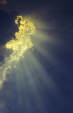 Sunbeams break through thunderclouds