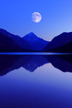 Lake Plansee with moon, Ammergebirge mountains, in the back Mt. Thaneller in the Lechtal Alps, Tyrol, Austria, Europe, composing