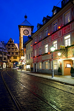 Schwabentor gate tower and Christmassy and snowy old town of Freiburg im Breisgau, Black Forest, Baden-Wuerttemberg, Germany, Europe