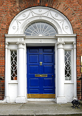 Blue front door of a terraced house near Merrion Park, Dublin, Republic of Ireland, Europe