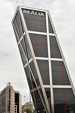 One of the modern towers Torres Kio or Puerta de Europa, at the Paseo de la Castellana, Plaza de Castilla, Madrid, Spain, Europe