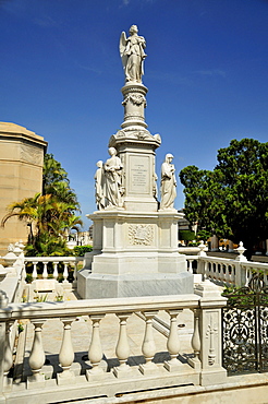 Statue of an angel on one of the monumental tombs, Colon Cemetery, Cementerio Cristobal Colon, named after Christopher Columbus, Havana, Cuba, Caribbean