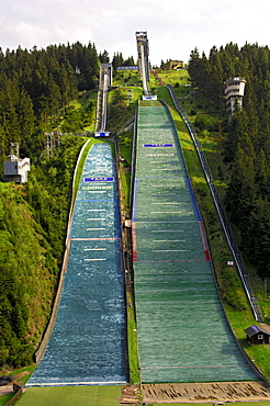 Normal and large ski flying hill, covered with jump mats, Am Kanzlersgrund ski jump complex in summer, near Oberhof, Thuringia, Germany, Europe