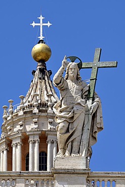 Statue of Jesus holding a cross above the colonnades, Basilica of Saint Peter, St. Peter's Basilica, Vatican City, Rome, Latium region, Italy, Europe