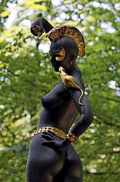 Female statue with an Iroquois haircut and a golden rat sitting on her shoulder, Ernst Fuchs Museum, former mansion of architect Otto Wagner, Vienna, Austria, Europe