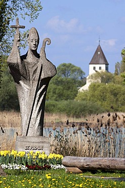 Statue of Saint Pirmin at the entrance of Reichenau Island, facing the Church of St. Georg, Reichenau Island, Konstanz district, Baden-Wuerttemberg, Germany, Europe