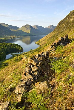 Old stone wall and the lake, England's deepest lake, lake Wastwater, lake Wast Water, Wasdale Valley, Lake District National Park, Cumbria, England, United Kingdom, Europe