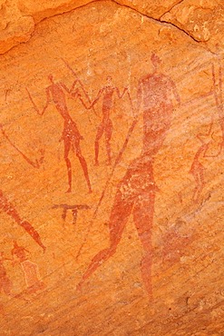 Painted people, neolithic rockart of the Acacus Mountains or Tadrart Acacus range, Tassili n'Ajjer National Park, Unesco World Heritage Site, Algeria, Sahara, North Africa