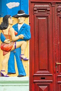 Facade relief of man and woman, El Caminito street, La Boca district, Buenos Aires, Argentina, South America