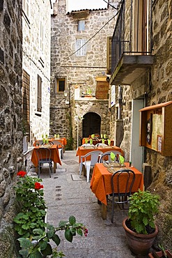 Restaurant in narrow street, Sartene, Corsica, France, Europe
