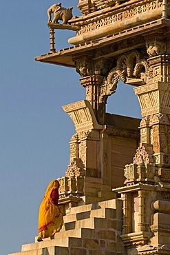 Women wearing a sari climbing the steps to Kandariya Mahadev Temple, Khajuraho Group of Monuments, UNESCO World Heritage Site, Madhya Pradesh, India, Asia