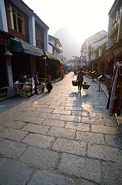 Street scene of cobblestone street, Guilin, Yangshou, Guangxi Province, China, Asia