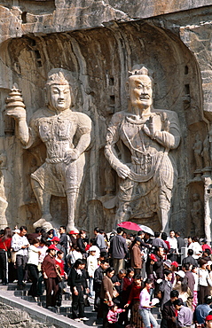 Bodhisattva and Guardian statues, Longmen Buddhist Caves, Ancestor Worshipping Temple dating from the Tang Dynasty, UNESCO World Heritage Site, Luoyang, Henan Province, China, Asia