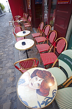 Detail of table and chairs at an outdoor cafe, Montmartre, Paris, France, Europe