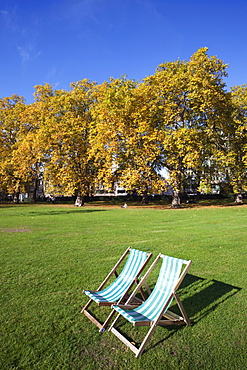 Autumn leaves and deck chairs, Green Park, London, England, United Kingdom, Europe